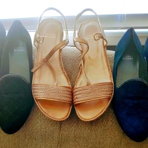 Three pair of Stuart Weitzman shoes.